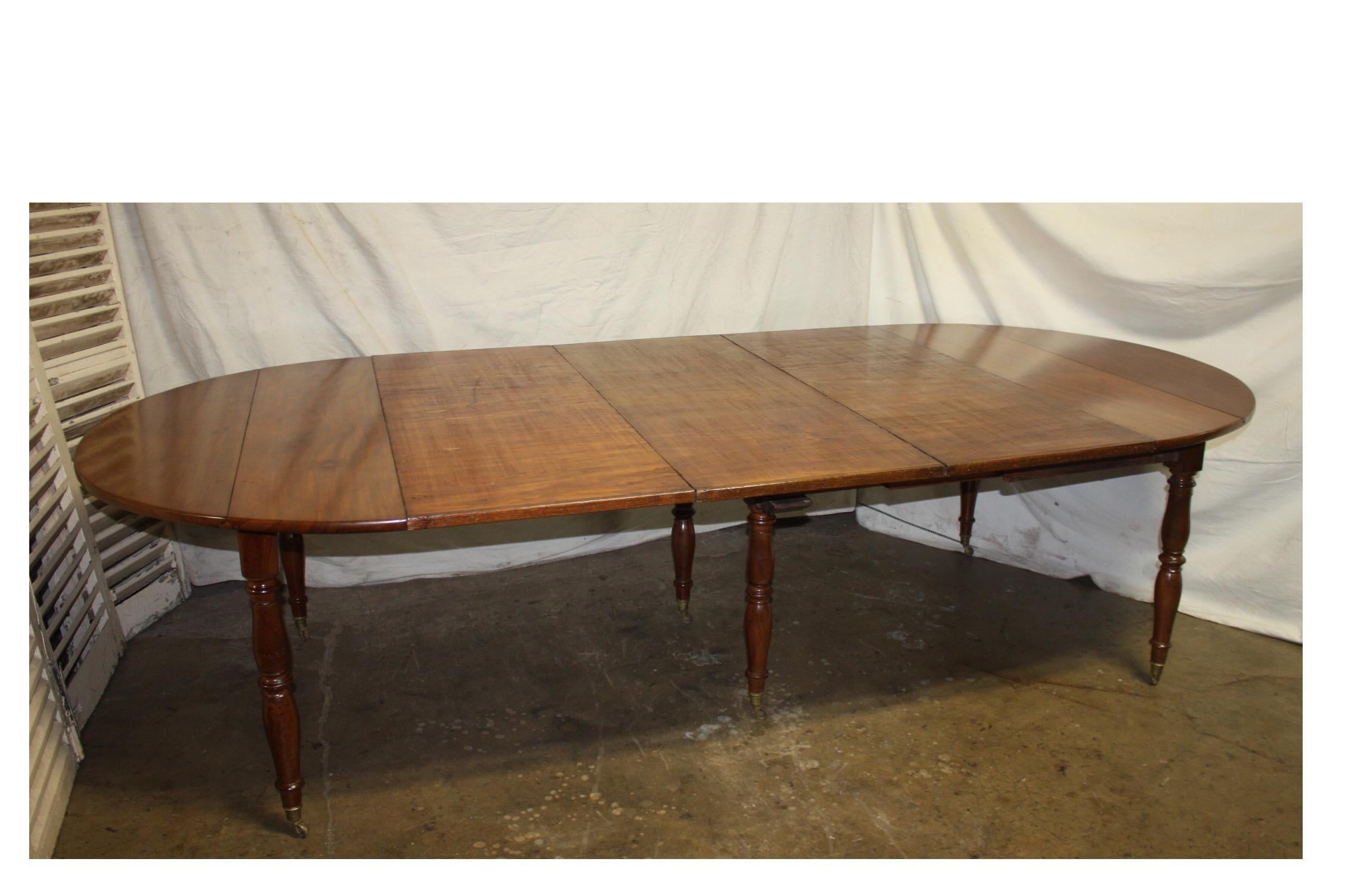 French 19th dining table with 3 extensions.