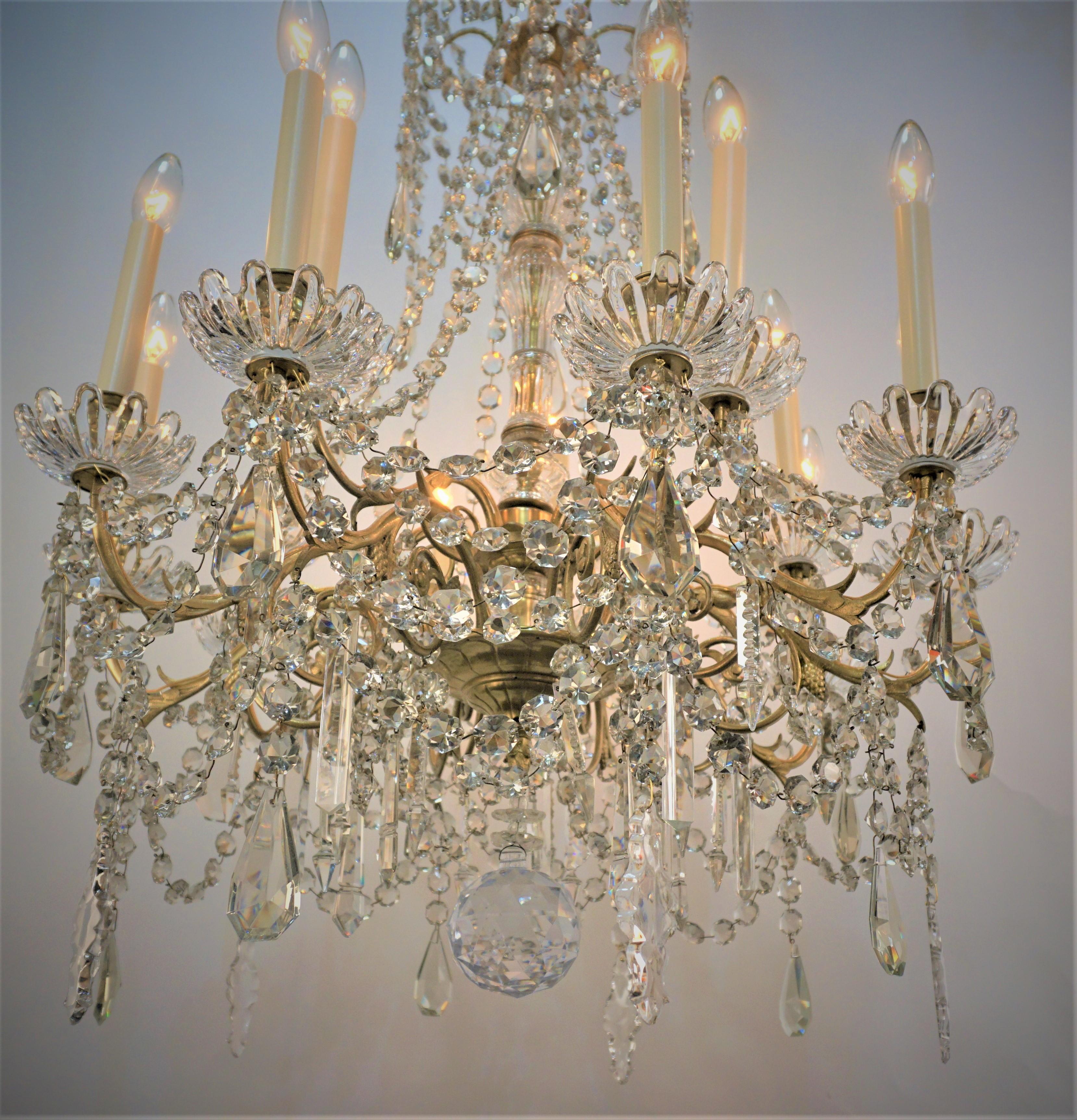 19th century fifteen light signed Baccarat crystal and bronze chandelier.
Professionally rewired and ready for installation.
Measurement: width 30