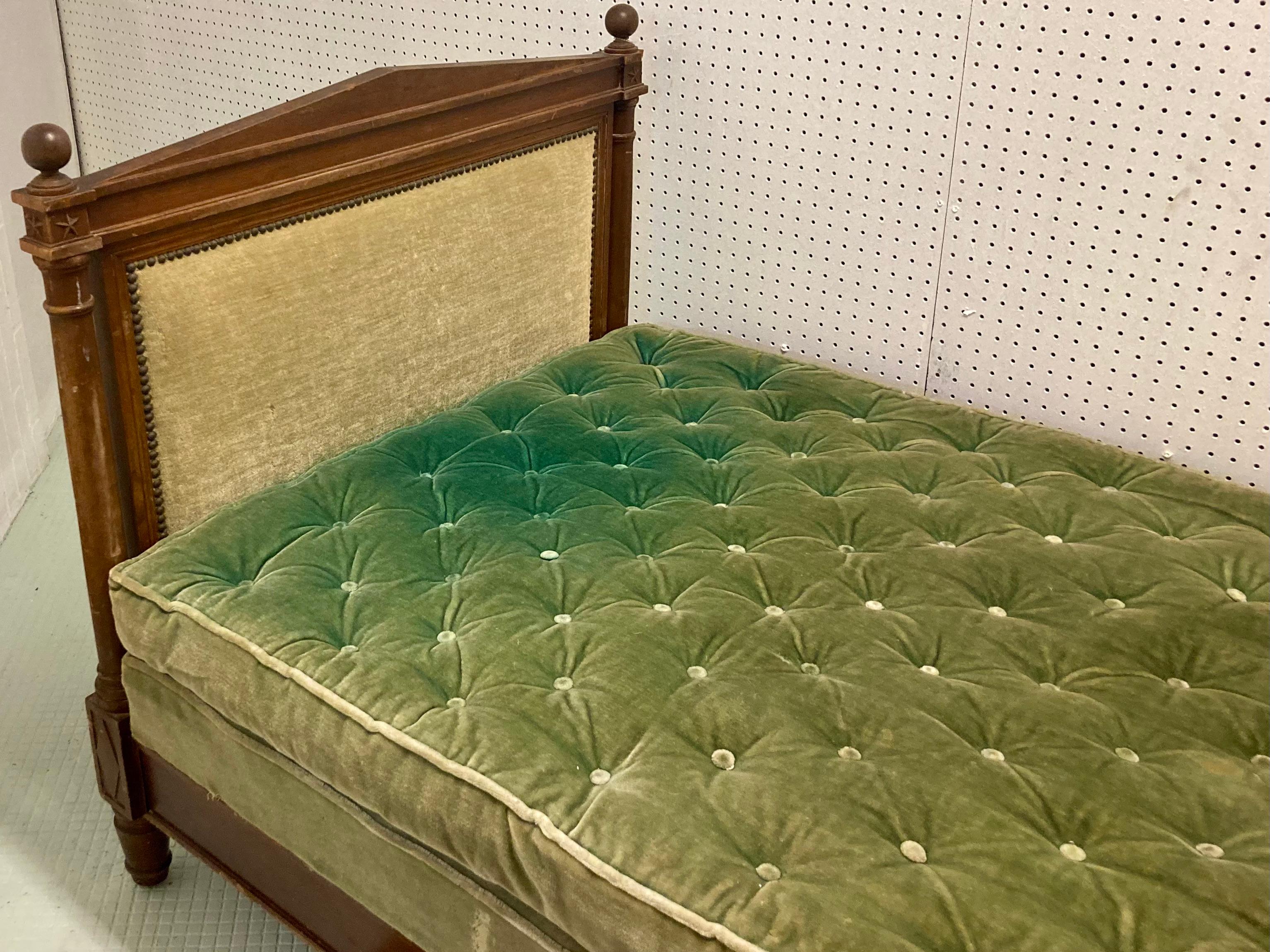 Beautiful French 19th Century Directoire daybed with original tufted upholstered seat cushion set. This is complete frame and seat cushion set. Leave as-is in original Mohhair fabric or recover everything to your liking. It is important to have the