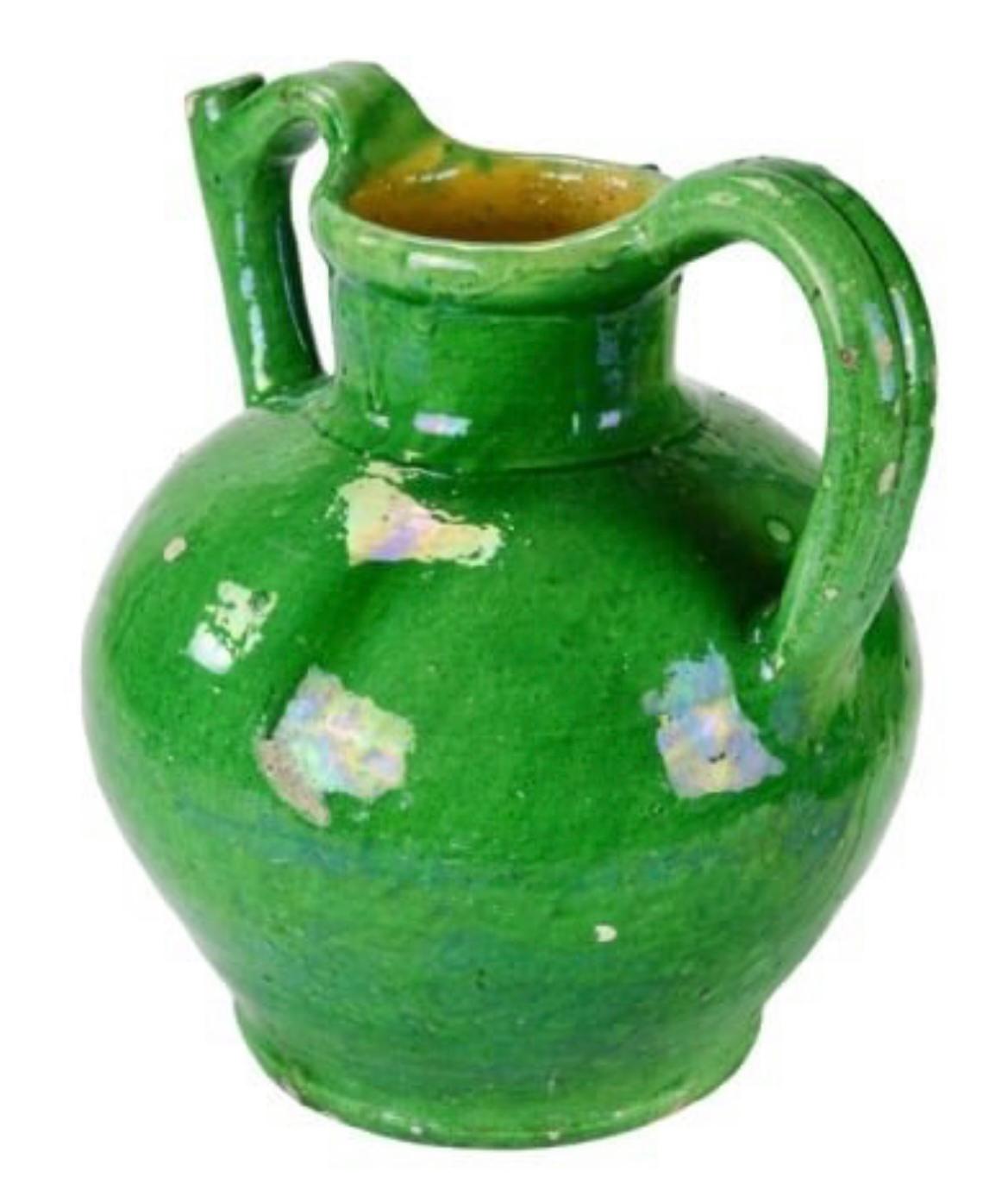 A French Provencale 2-handled pitcher in green glaze, late 19th century. 