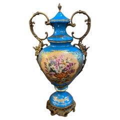 French 20 th century hand painted royal blue porcelain ormolu sevres.Urn
