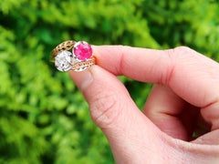 French 2.05 Carat Ruby and 0.85 Carat Diamond 18k Yellow Gold Twist Ring Circa 1