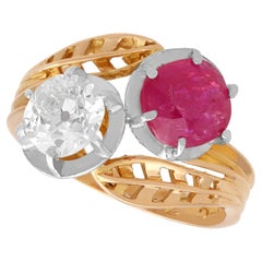 French 2.05 Carat Ruby and 0.85 Carat Diamond 18k Yellow Gold Twist Ring Circa 1