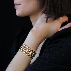 Bracelet français du 20ème siècle en or rose 18 carats à facettes