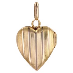 Pendentif français du 20ème siècle en or rose 18 carats avec médaillon en forme de cœur