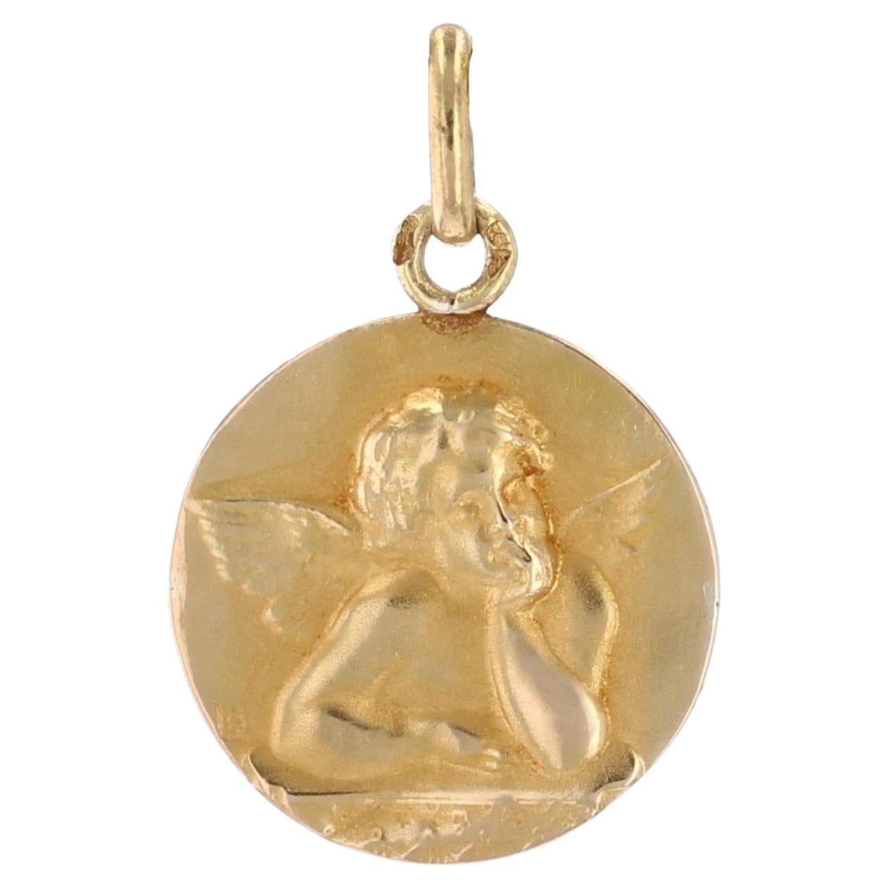 Pendentif médaille chérubin en or jaune 18 carats du 20e siècle français