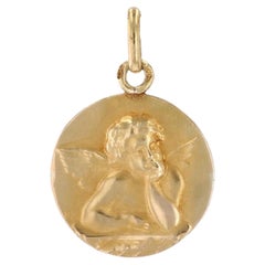 Pendentif médaille chérubin en or jaune 18 carats du 20e siècle français
