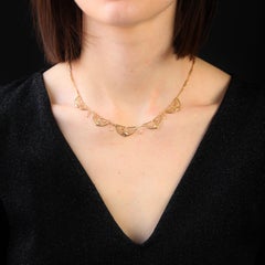 Collier drapé en or jaune 18 carats français du 20e siècle
