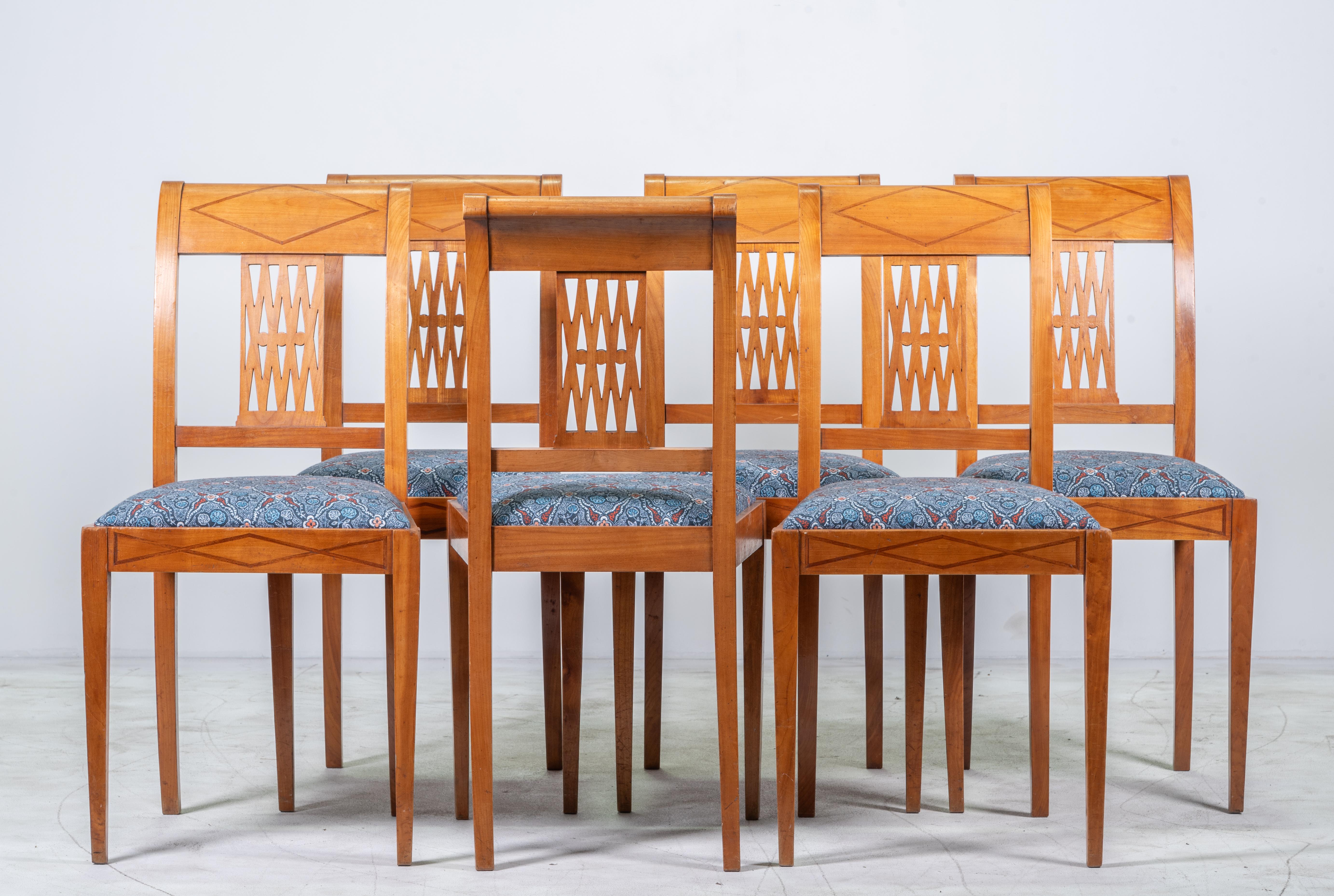 This stunning set of six French Art Deco dining chairs from the early 20th century brings timeless elegance and modern functionality together beautifully. Each chair is crafted in the iconic Art Deco style, characterized by sleek lines, geometric