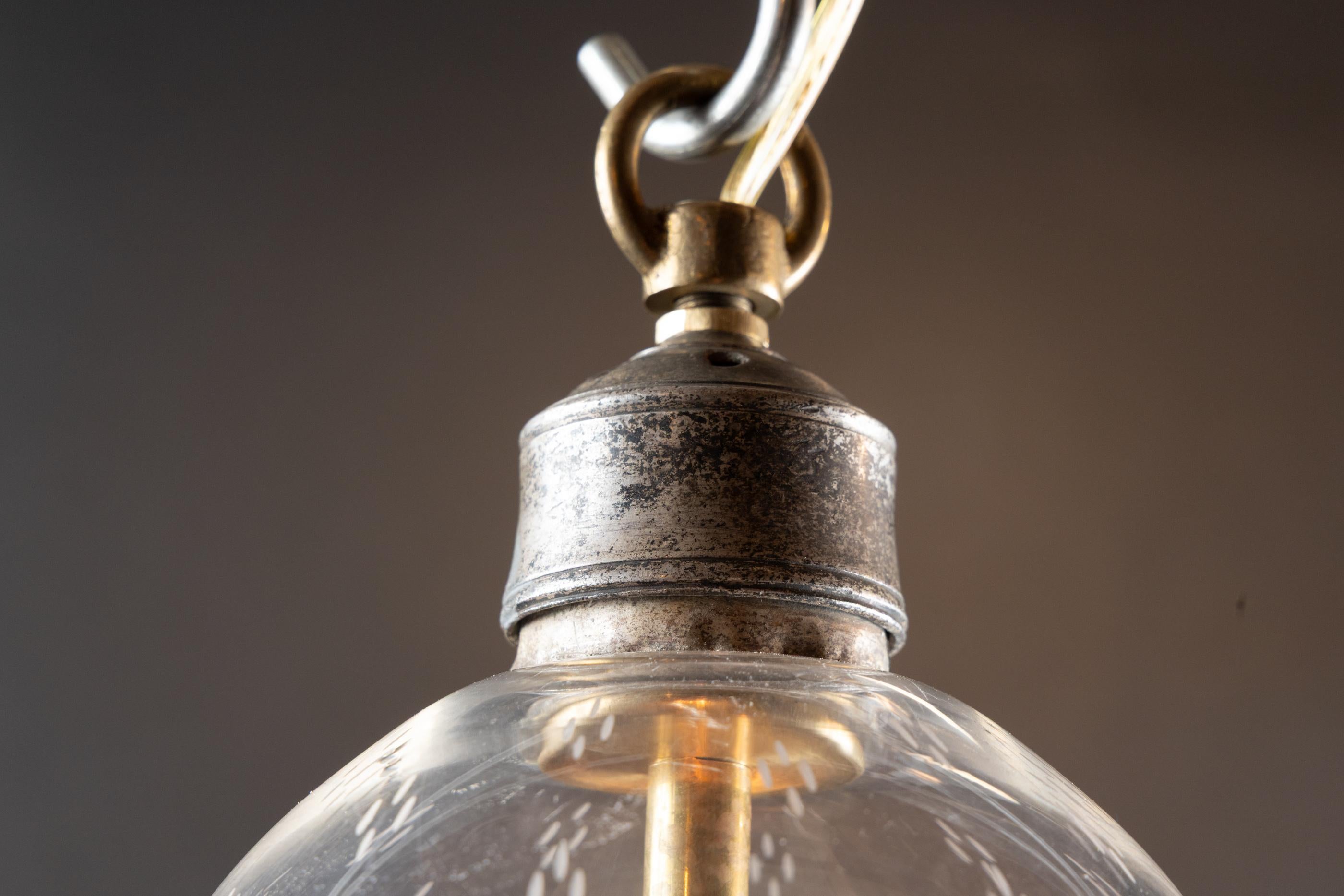 French 20th Century glass Bell shaped hanging globe decorated with fine etchings of a floriate motif alongside patterned details at top.

