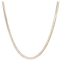 Collana francese del 20° secolo con chiusura a smalto e doppia maglia in oro giallo 18 K.