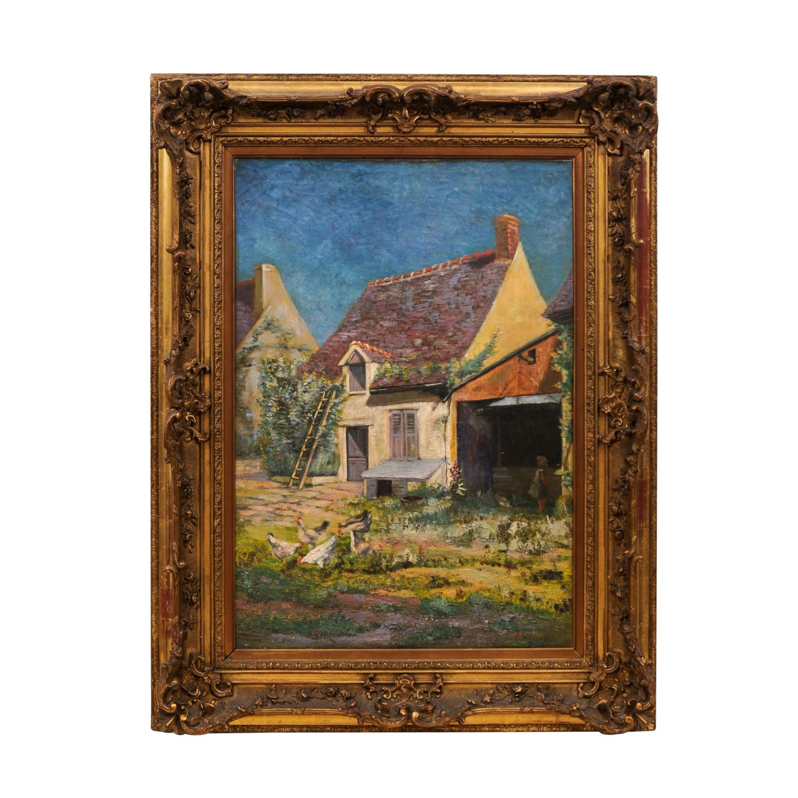 A framed French farmyard scene from the 20th century, by H. Greilschmez. Created in France during the 20th century, this vertical painting features a humble farmyard scene depicting a few houses with slanted roofs standing out beautifully on a blue