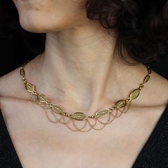 Französische Perlenkette aus 18 Karat Gelbgold des 20.