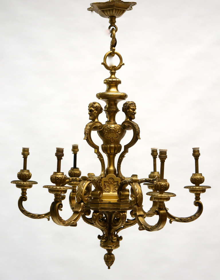 A quality French gilded bronze six-light Mazarin antique chandelier, having the original ceiling rose with super original gilded patination.
Excellent quality and very well cast.
Measures: Diameter 60 cm.
Height fixture 68 cm.
Total height 80 cm.