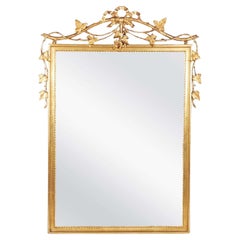 French 20th Century Giltwood Mirror with Ribbon & Leaf Design