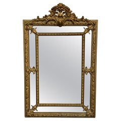 French 20th Century Rectangular Vertical Gold Gilt Mirror with Floral crest