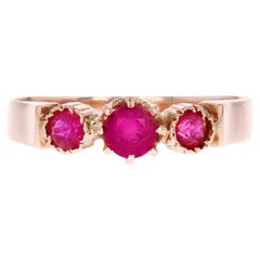 French 20th Century Red Gems 18 Karat Rose Gold Trilogy Ring