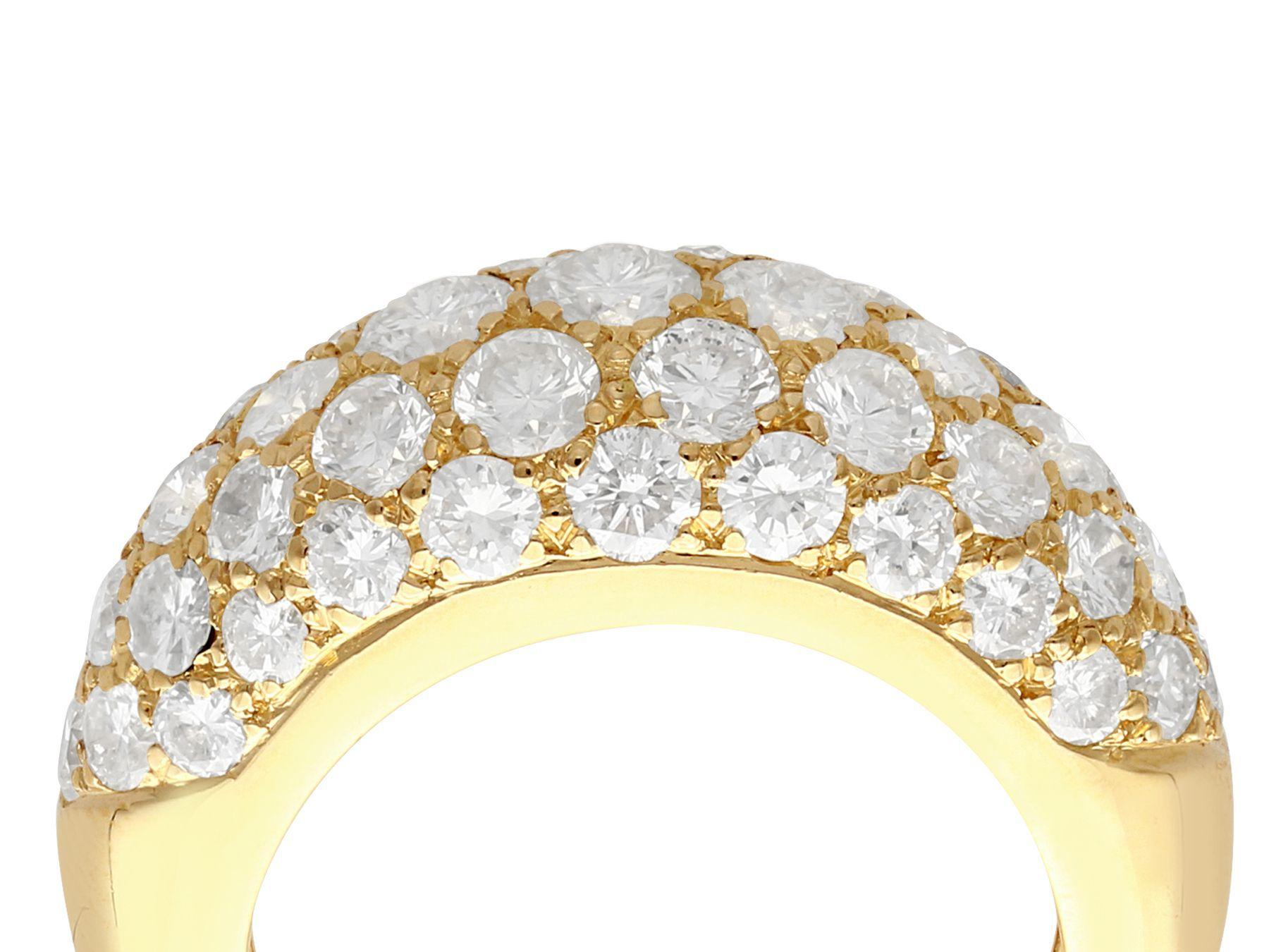 A stunning, fine and impressive vintage 2.15 carat diamond and 18 karat yellow gold cocktail ring; part of our diverse diamond jewelry and estate jewelry collections.

This stunning, fine and impressive vintage ring has been crafted in 18k yellow