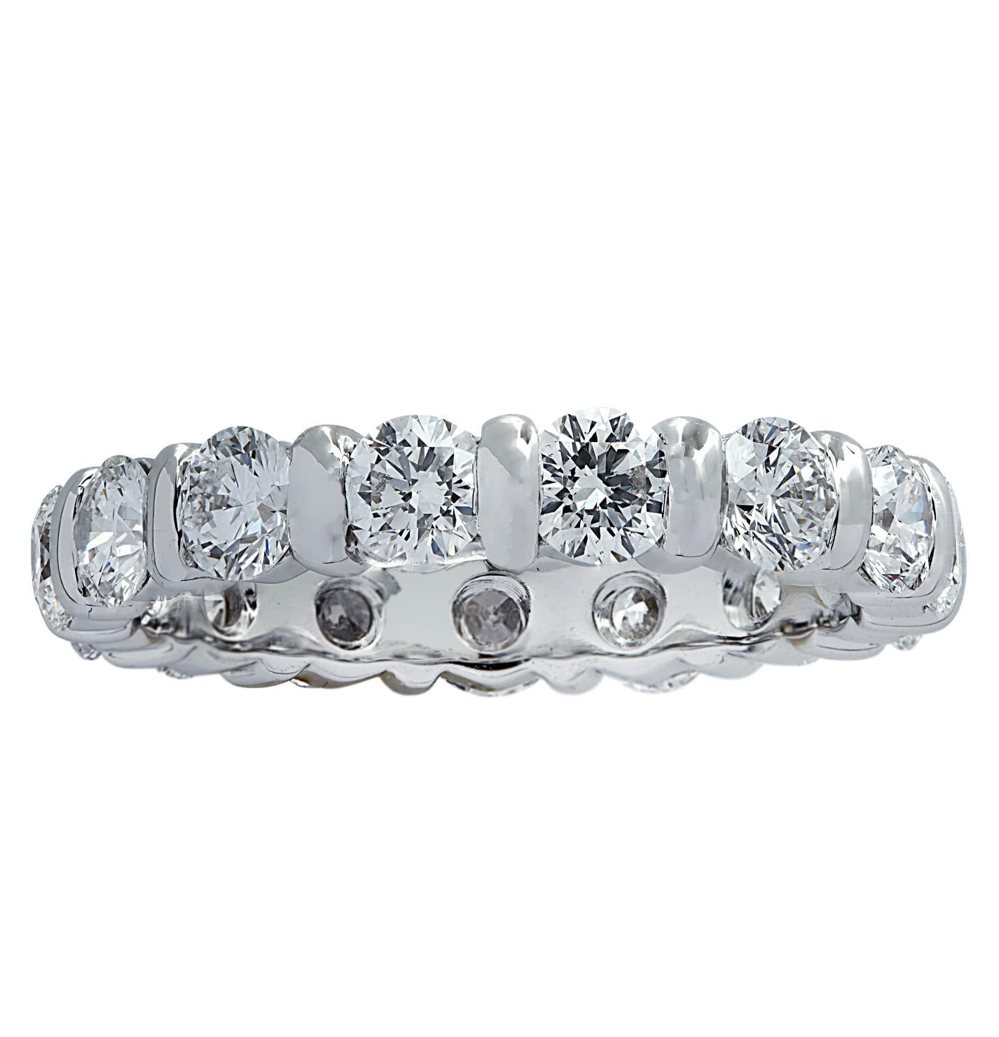 Exquisite eternity band crafted in France in 18 karat white gold, showcasing 15 stunning round brilliant cut diamonds weighing approximately 3 carats total, F color, VS clarity. Each diamond was carefully selected, perfectly matched and set in a sea