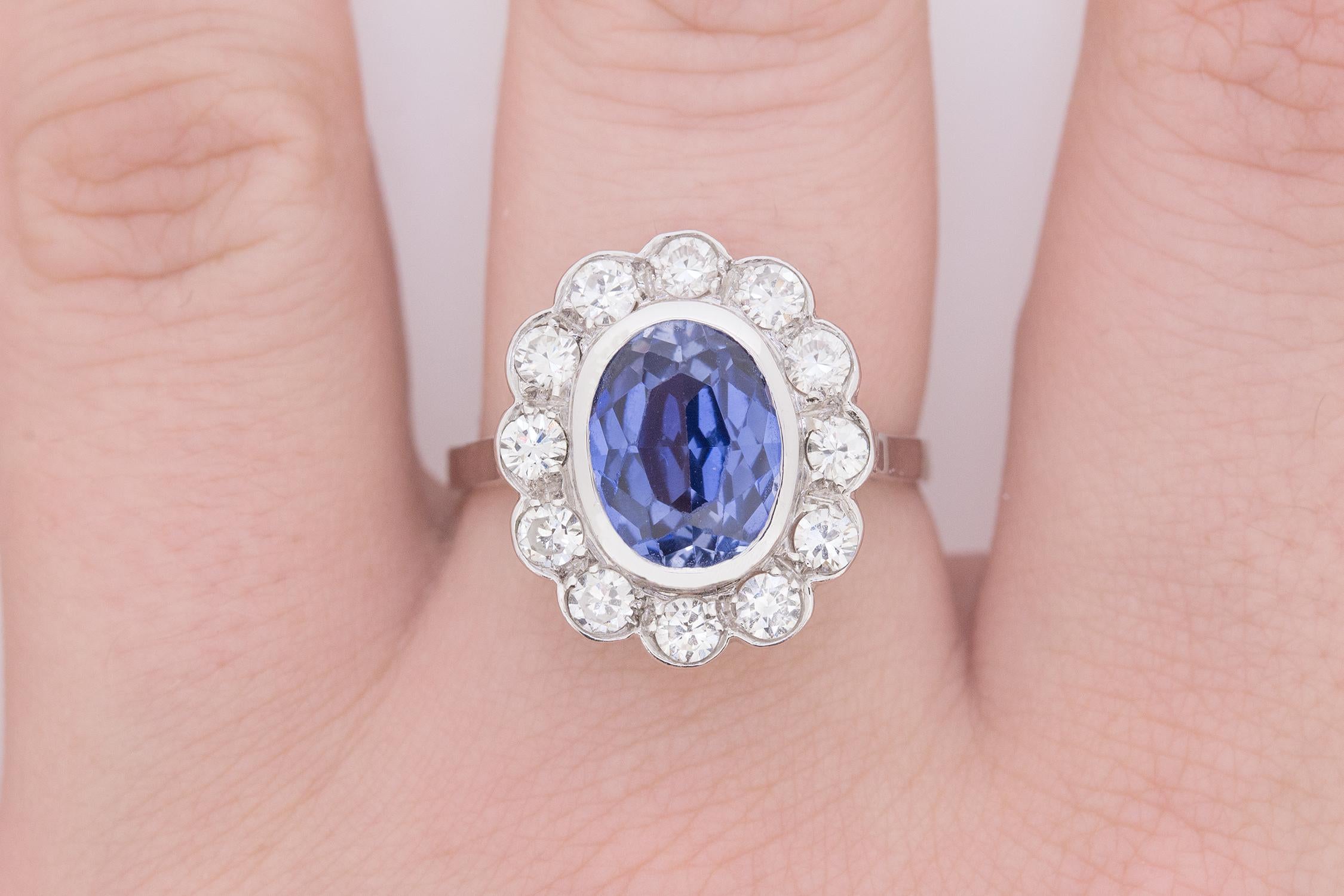 French 3.00 Carat Sapphire and 1.20 Carats Diamonds Halo Ring circa 1940s 1