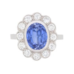 French 3.00 Carat Sapphire and 1.20 Carats Diamonds Halo Ring circa 1940s