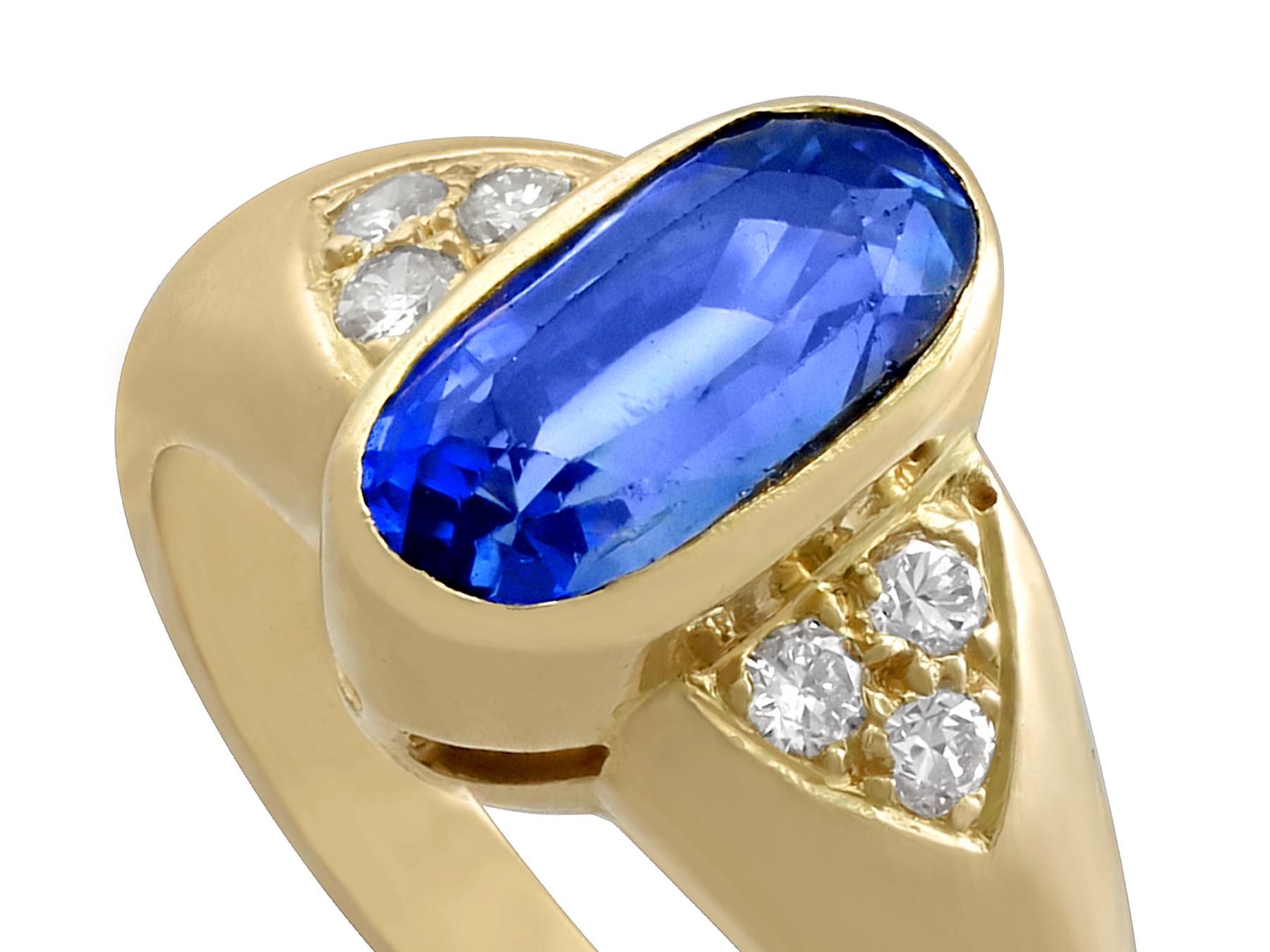A stunning, fine and impressive vintage French 3.39 carat natural blue sapphire and 0.18 carat diamond (total) dress ring in 18 karat yellow gold; part of our vintage jewelry and estate jewelry collections.

This stunning, fine and impressive