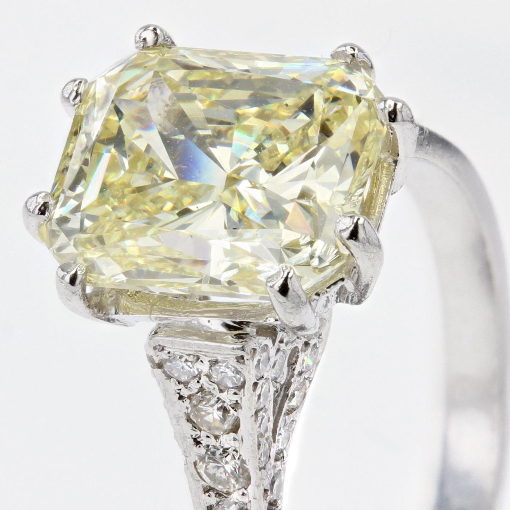 French 3.65 Carat Fancy Yellow Emerald Cut Diamond Platinum Ring For Sale 3