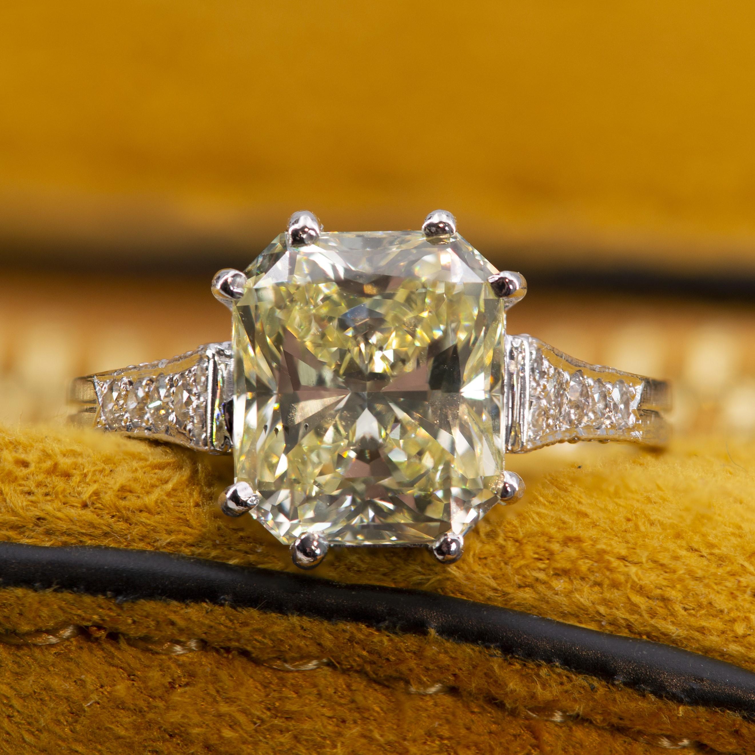 French 3.65 Carat Fancy Yellow Emerald Cut Diamond Platinum Ring For Sale 5