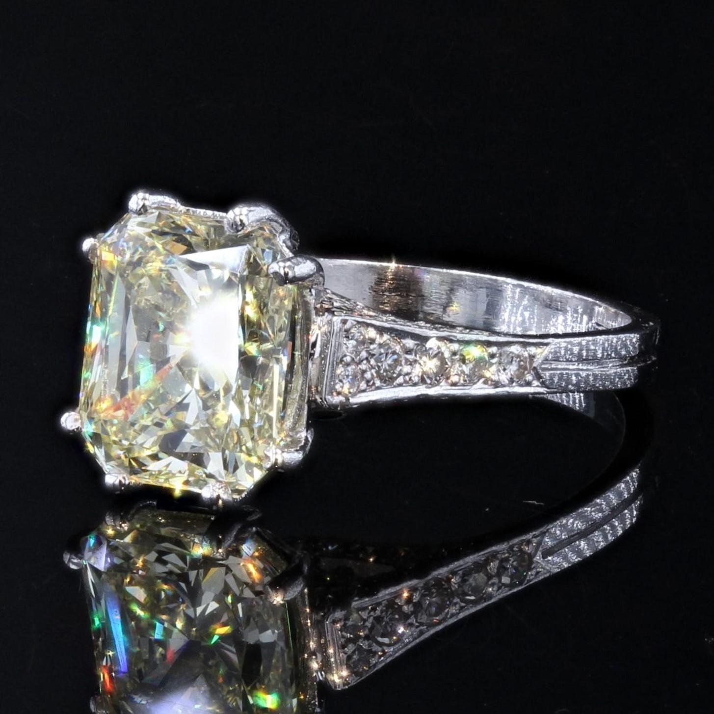 Modern French 3.65 Carat Fancy Yellow Emerald Cut Diamond Platinum Ring For Sale
