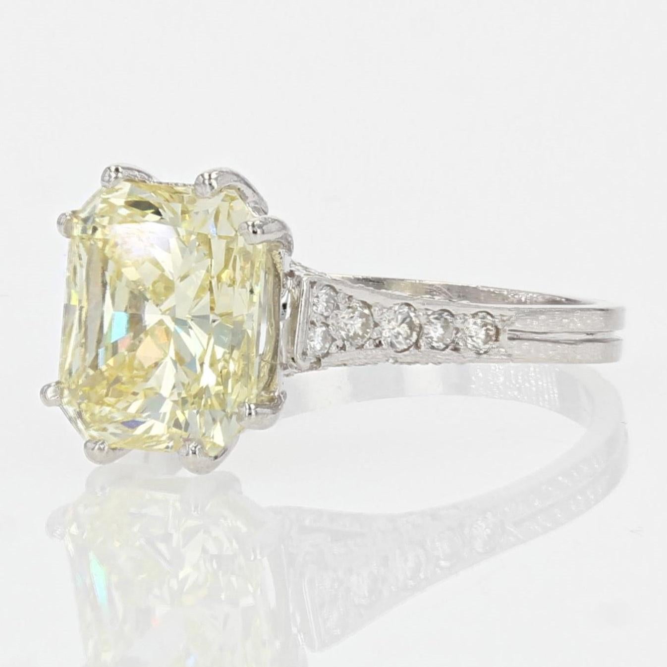 French 3.65 Carat Fancy Yellow Emerald Cut Diamond Platinum Ring For Sale 2