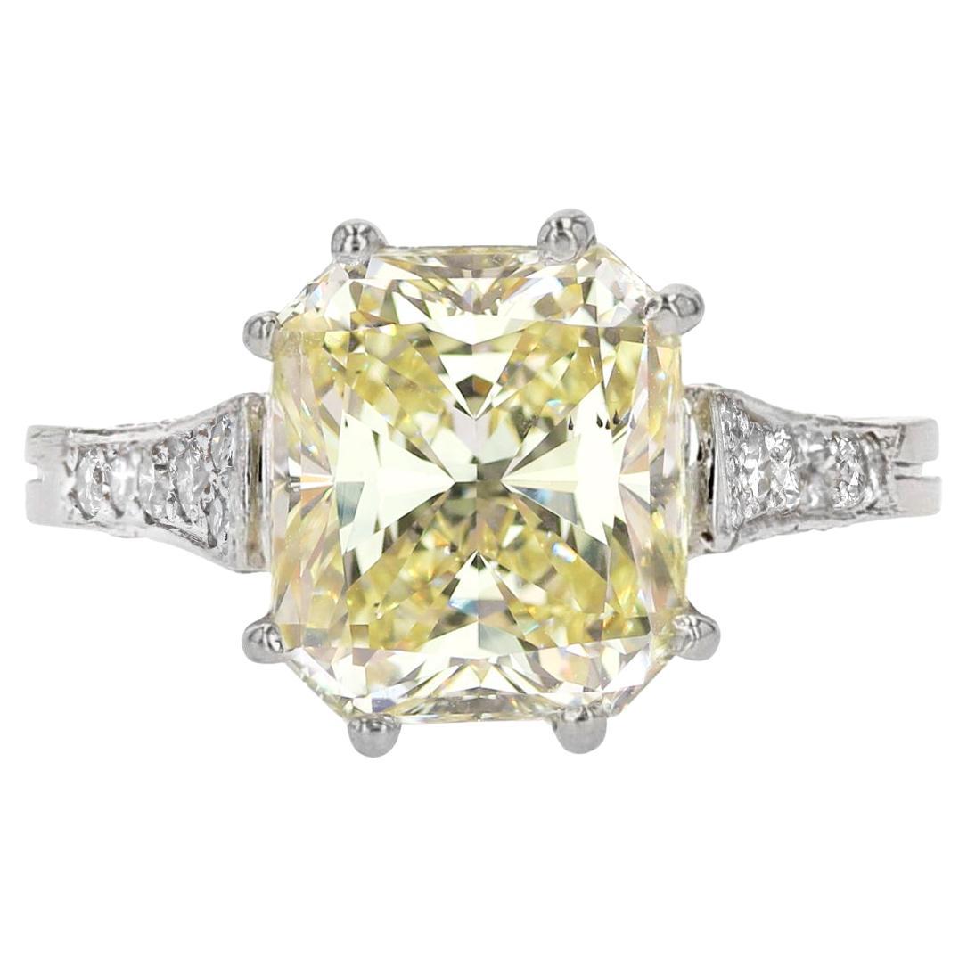 French 3.65 Carat Fancy Yellow Emerald Cut Diamond Platinum Ring For Sale