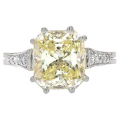 French 3.65 Carat Fancy Yellow Emerald Cut Diamond Platinum Ring
