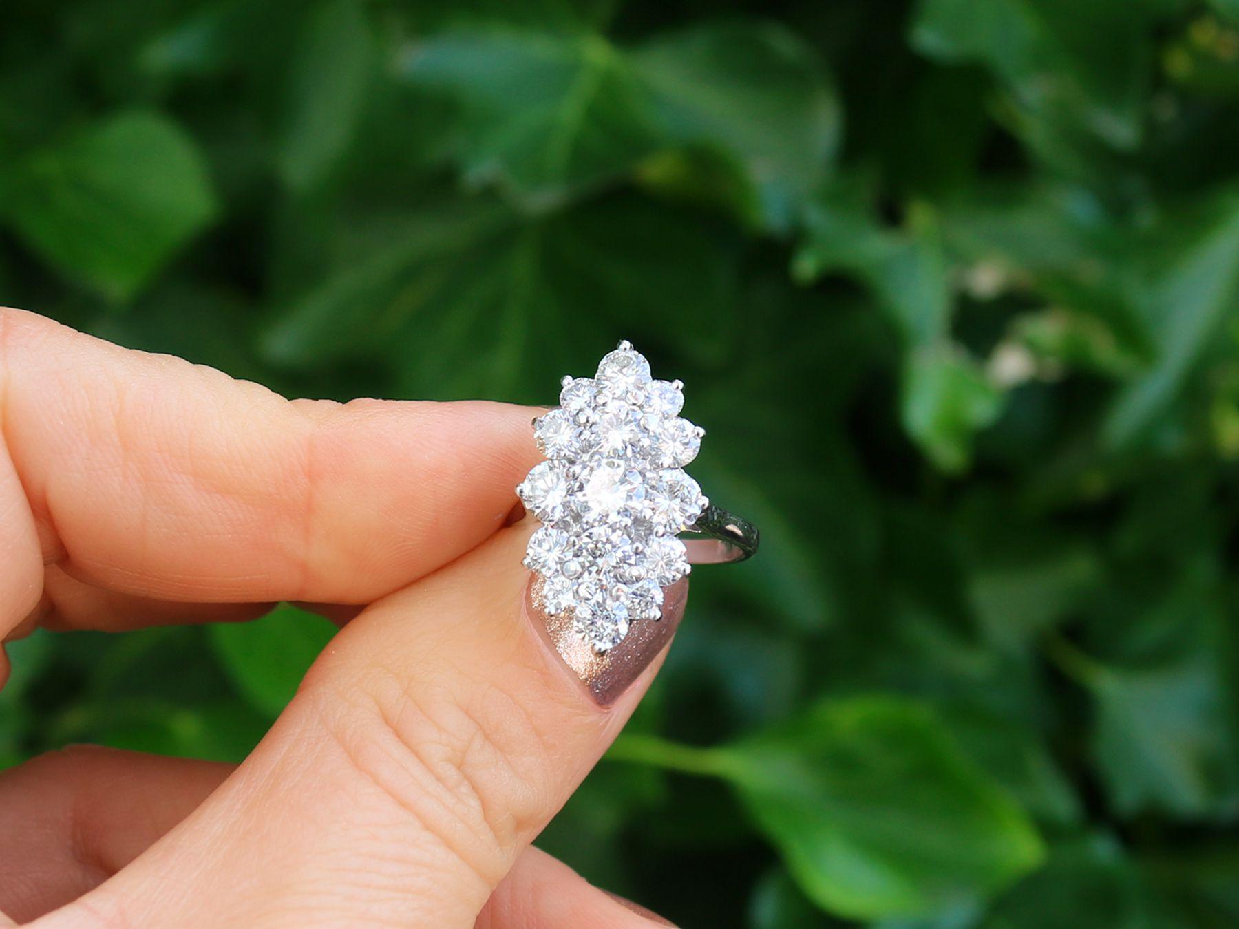 A stunning vintage French 3.96 carat diamond and 18 karat white gold cocktail ring; part of our diverse antique jewelry and estate jewelry collections.

This stunning, fine and impressive vintage ring has been crafted in 18k white gold.

The