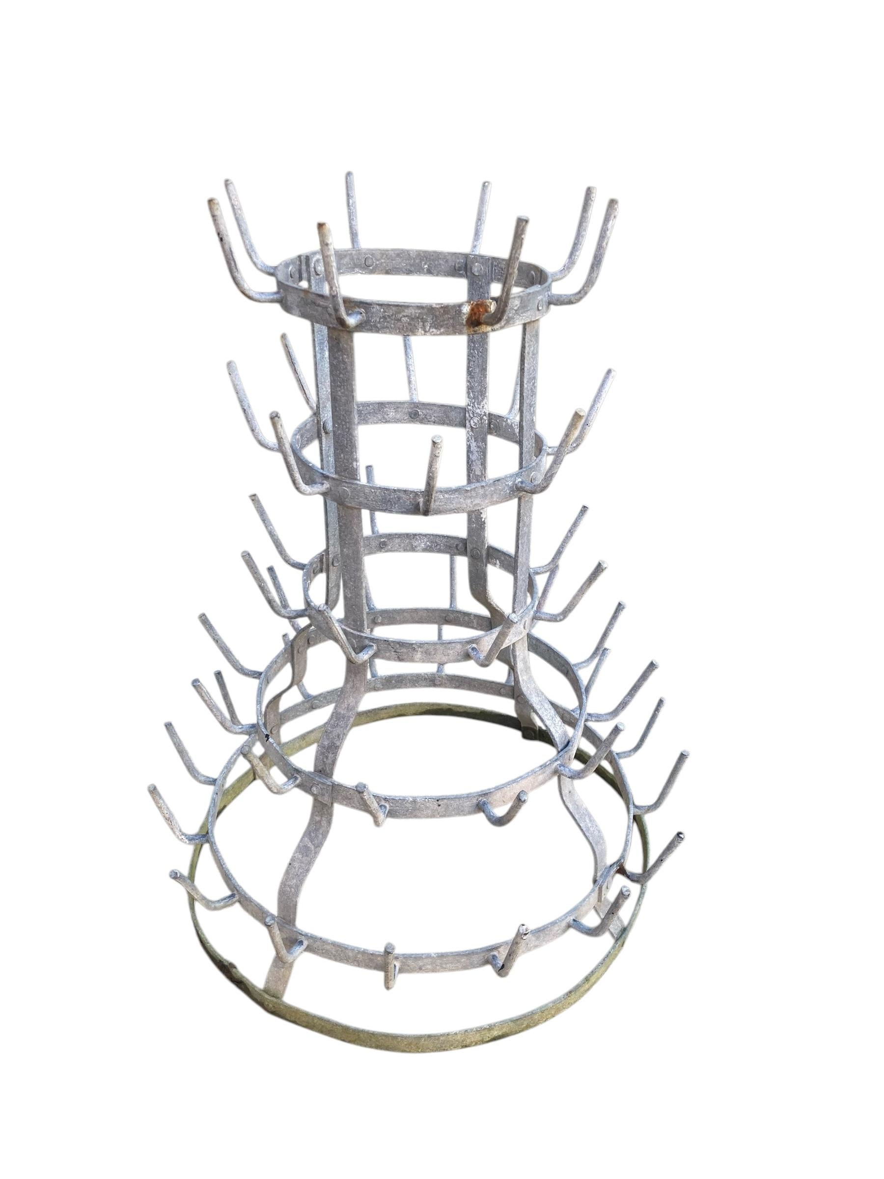 French 52 Peg Bottle Dryer or Garden sculpture. A truly beautiful and brutalistic item. Mid Century CIRC 1950's

H: 42 cm

Base: 57 cm