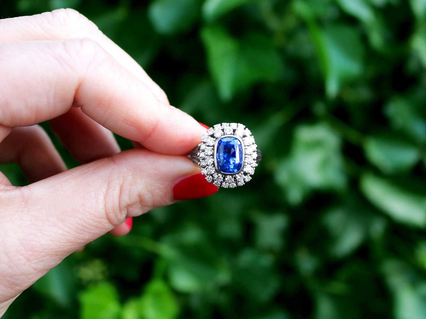 A stunning vintage French 5.40 carat Ceylon sapphire and 1.45 carat diamond, 18 karat white gold dress ring; part of our diverse gemstone jewelry and estate jewelry collections.

This stunning, fine and impressive cushion cut Ceylon sapphire ring