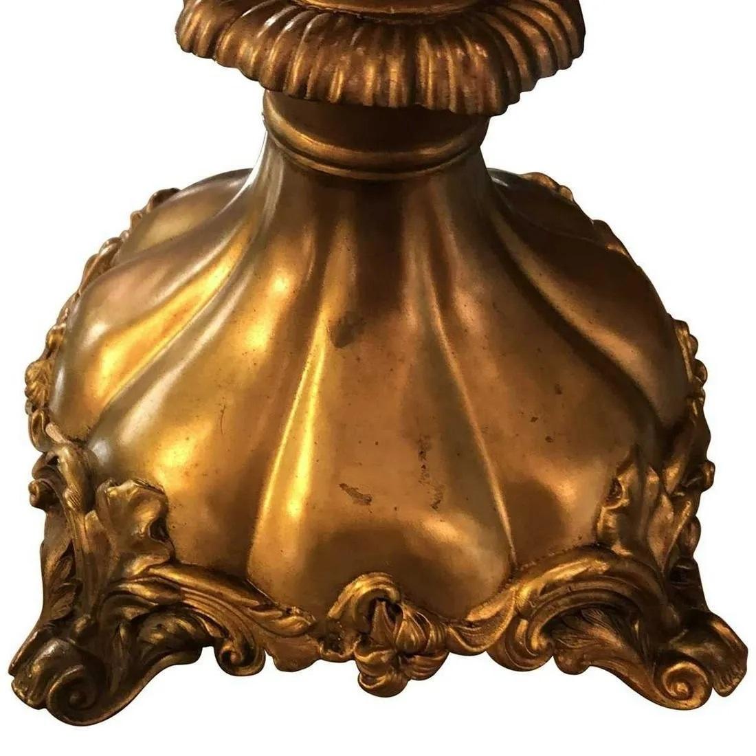 Pair of 7 Light Bronze Candelabras stand tall and are great or a large setting. The candle holders are removable if seen necessary Gilt bronze. Six detachable arms. Decorated with foliage and flowers. Dimensions Height 31
