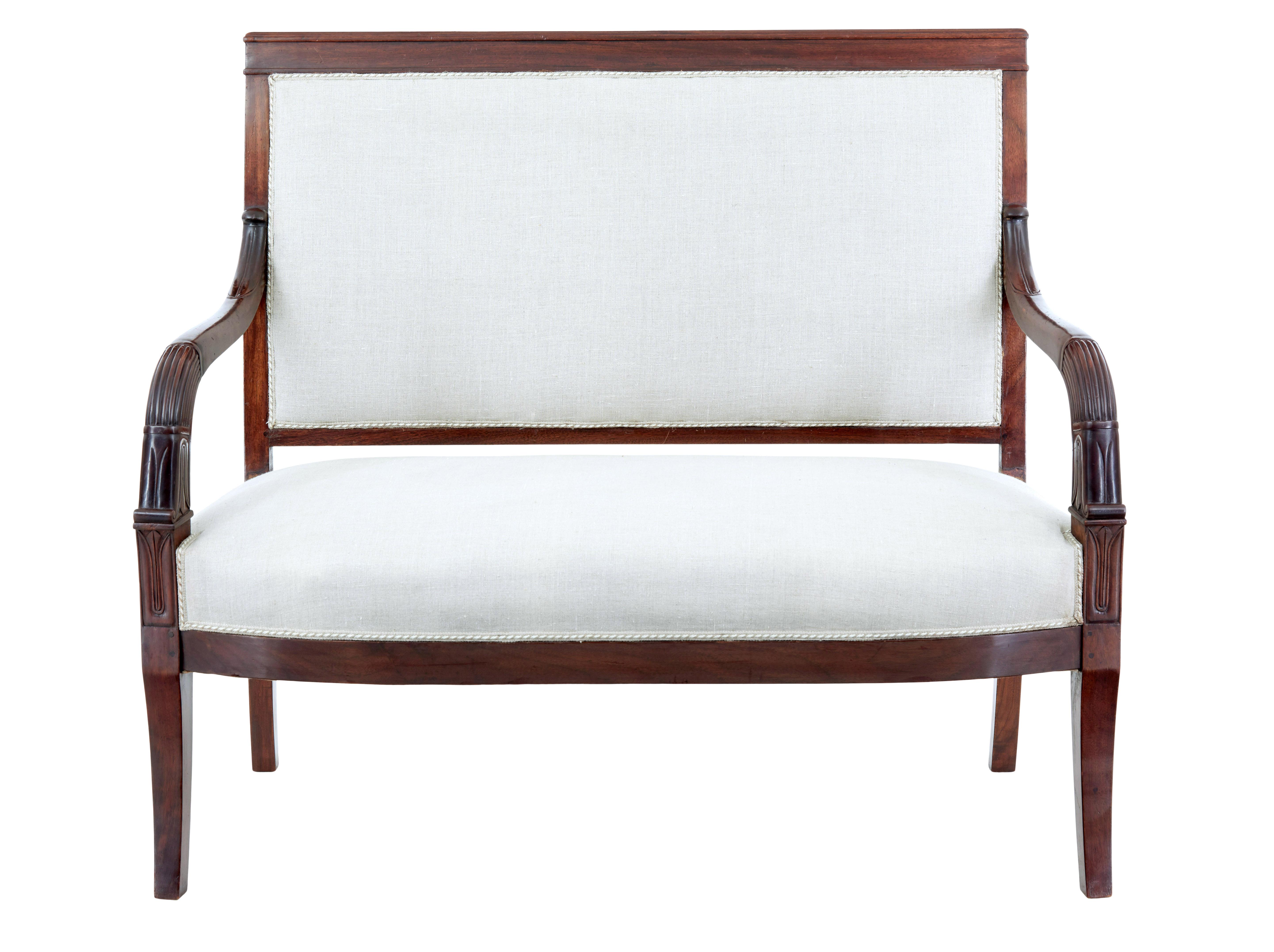 7 piece 19th century french empire mahogany salon suite circa 1880.

Rare 7-piece salon suite made in rich mahogany. Set comprises of a 2-seat sofa, 2 armchairs and 4 open armchairs. Architectural backs with carved scrolling arms, all standing on