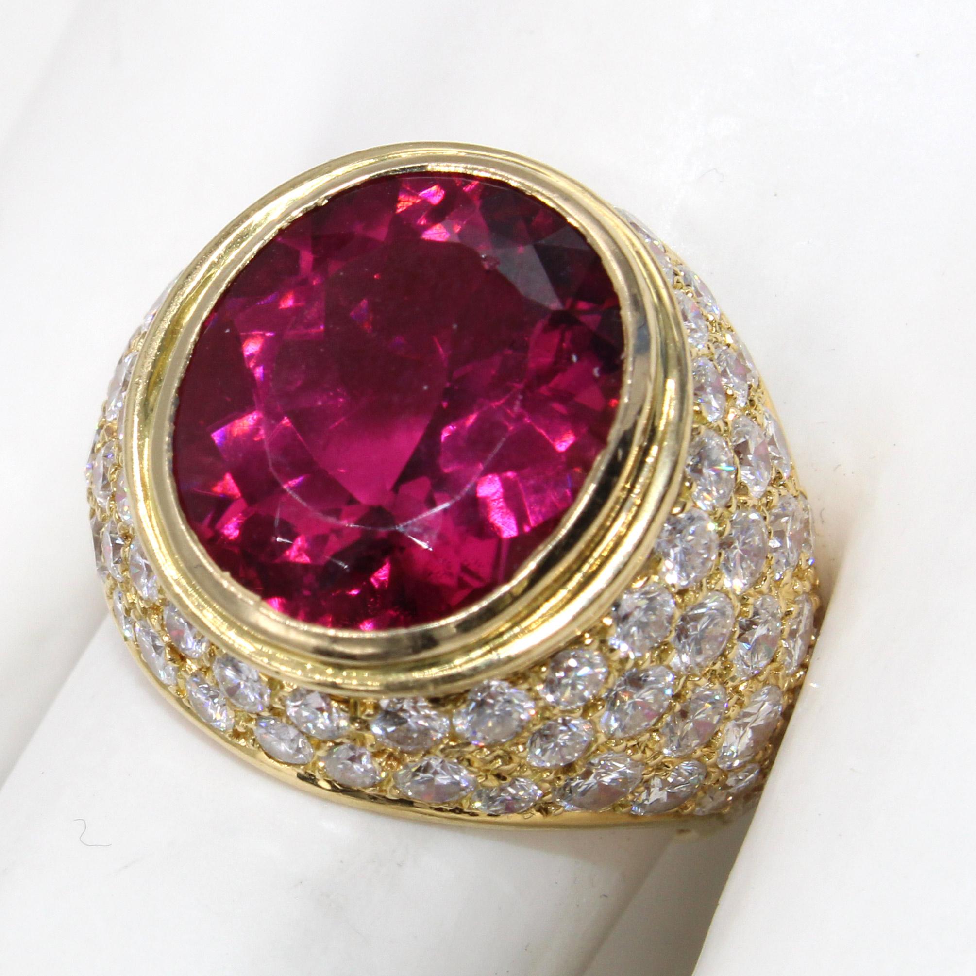 Beautifully designed and masterfully handcrafted this bold French 1980s ring features a gem quality Rubellite weighing 7.53 carats. The Rubellite exhibits and amazing saturation of color and the perfect cut brings out an extraordinary brilliance and