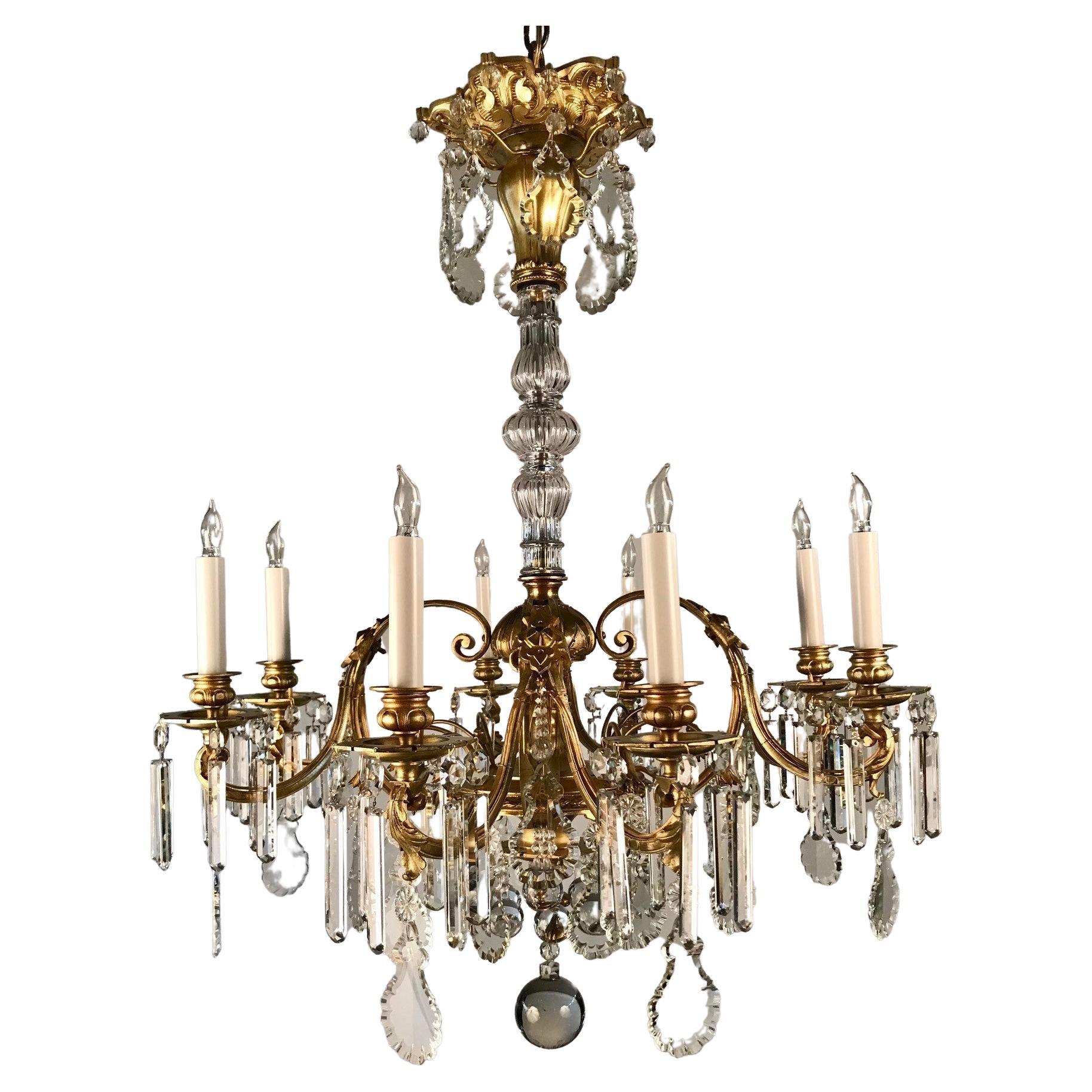 French 8 Light Bronze Chandelier Hung with Crystal Drops For Sale