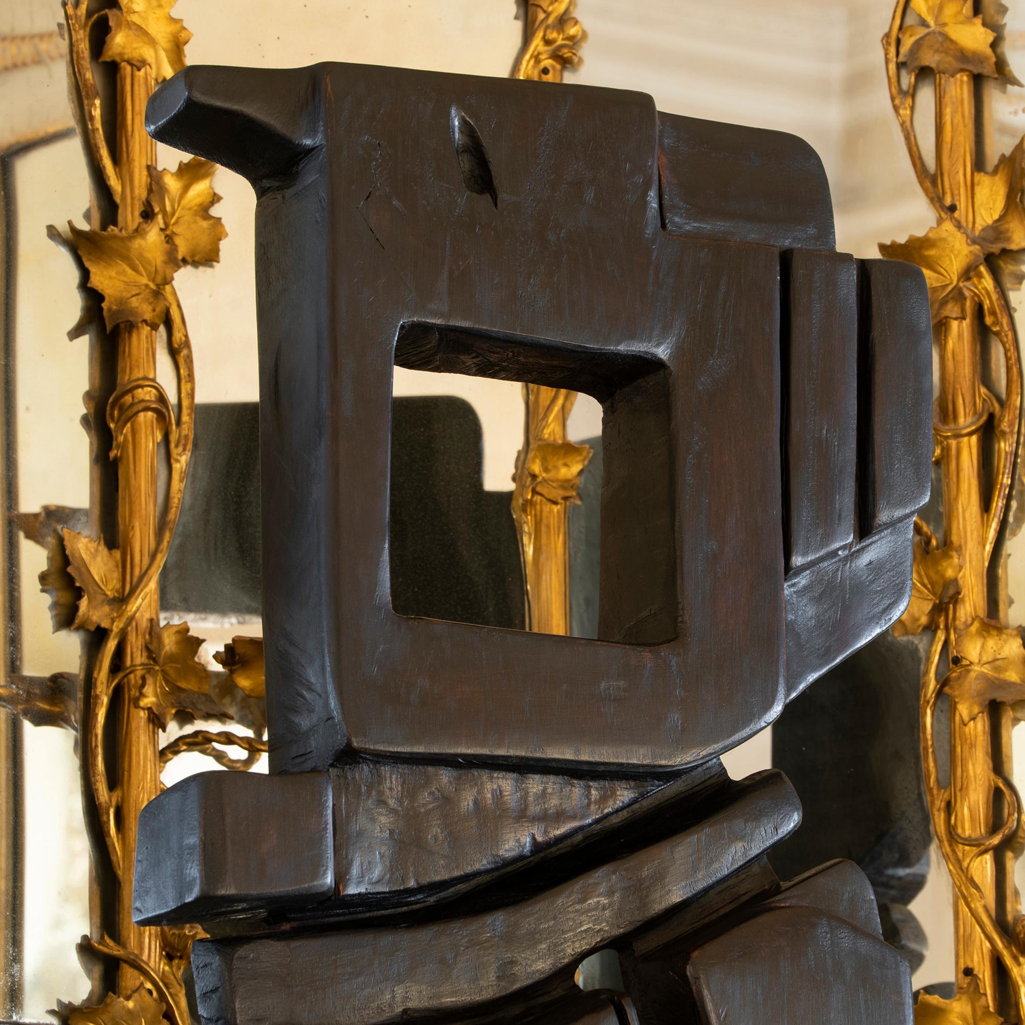 Carved wood abstract sculpture in fine vintage condition with natural cheques in the wood and minor signs of age appropriate wear, France circa 1960.