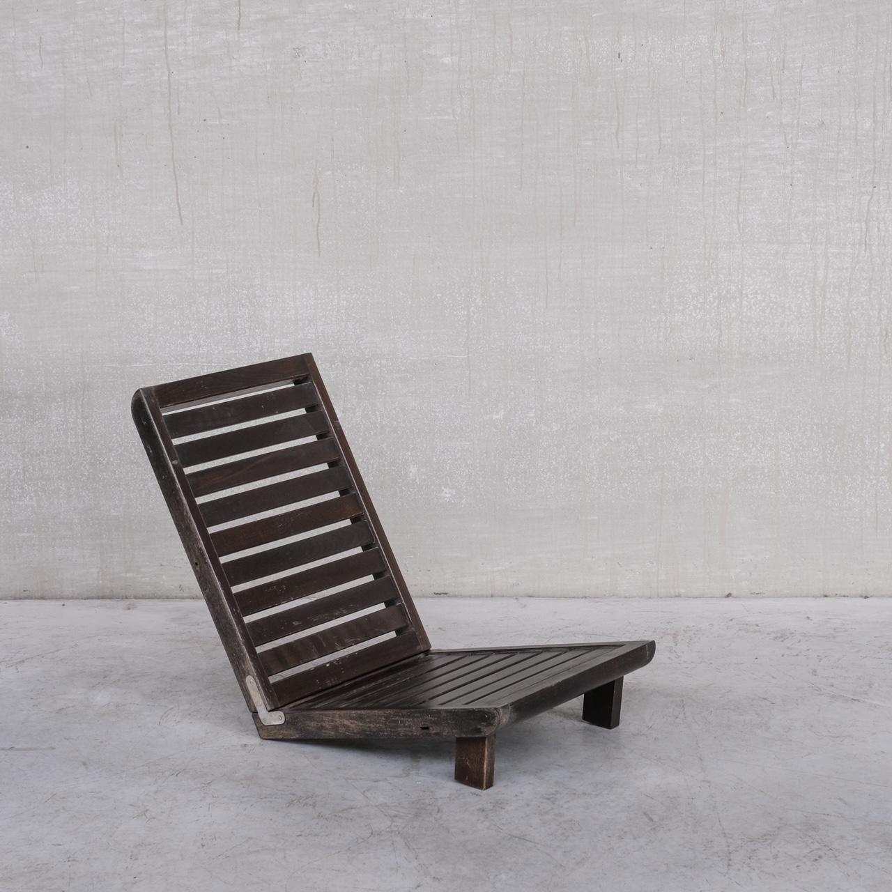 A low architectural slatted lounge chair. 

France, c1960s. 

Sourced from an Alpine resort. 

The chair designer is unknown but has echoes of the designers prominent in the design of the French alpine resorts, such as Perriand and Maison