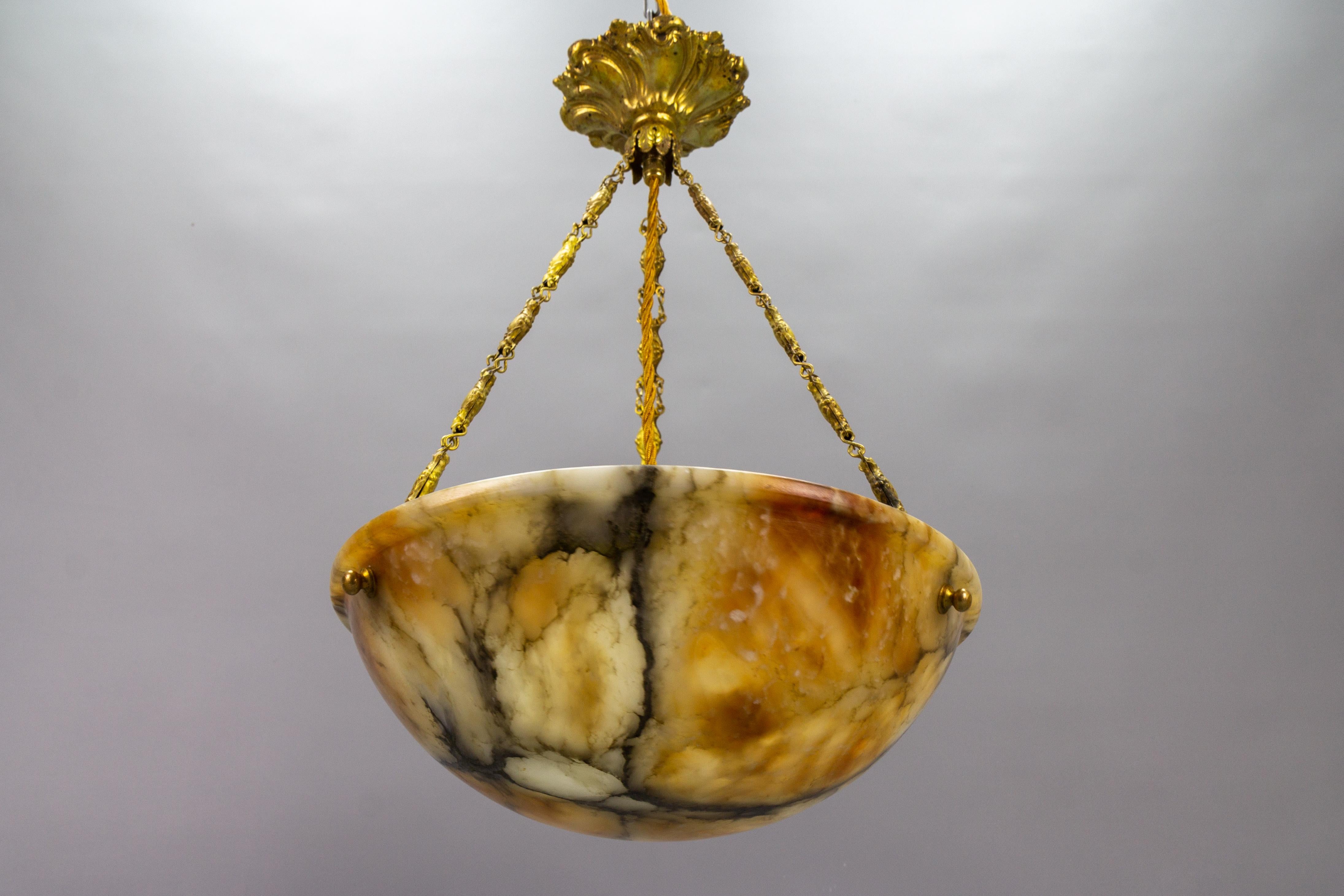Art Deco French Amber Color Alabaster and Brass Pendant Light, circa 1930 For Sale