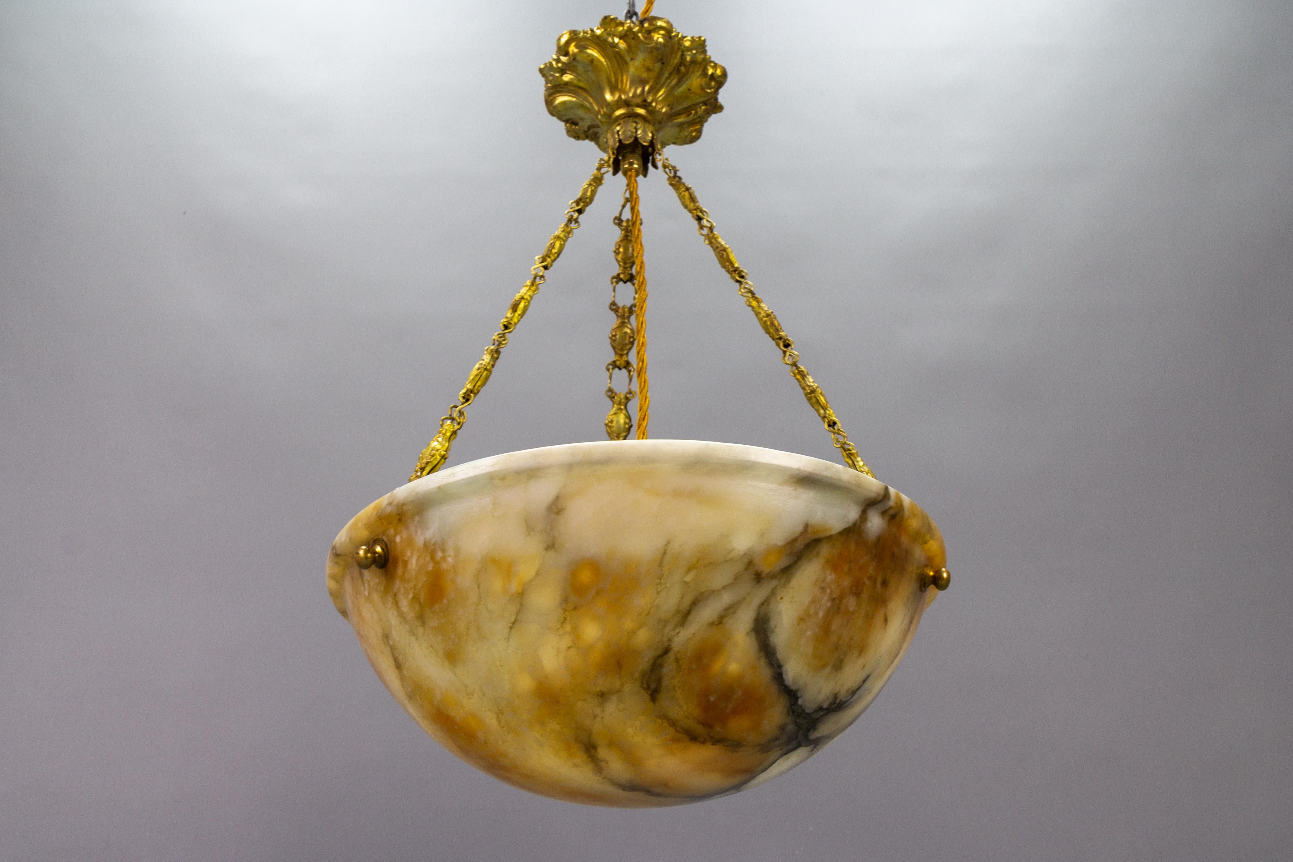 French Amber Color Alabaster and Brass Pendant Light, circa 1930 For Sale 1