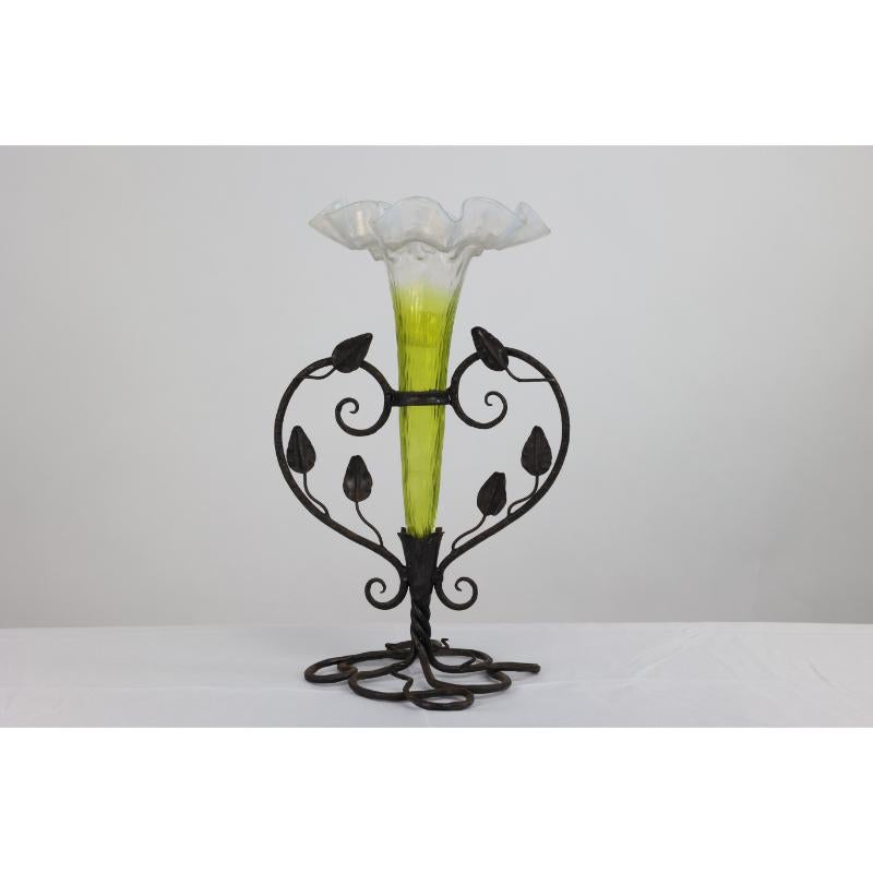 Early 20th Century Art Nouveau French hand made iron epergne with a green & Vaseline glass flower. For Sale