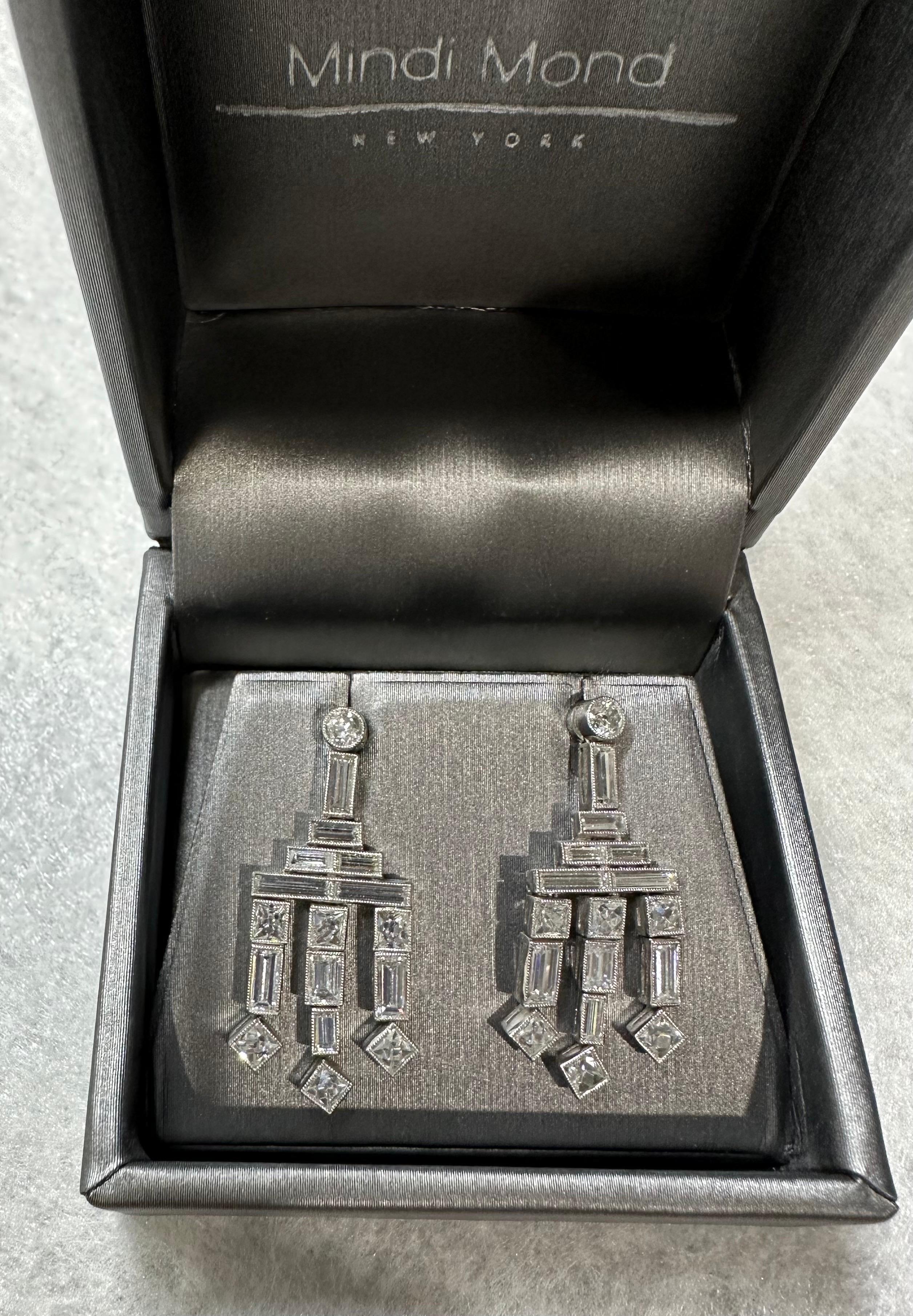 French & Baguette diamonds set in a deco style/ contemporary hand made platinum setting. 
2 brilliant cut diamond post back at top anchor these dazzling chandelier style earrings. With the perfect amount of movement. 2 round brilliant-.27,