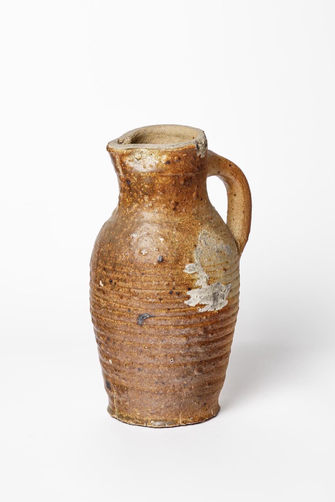Martincamp - France

Antic 18th century stoneware ceramic pitcher

Original good condition - some original little cracks

Height 27 cm
Large 17 cm