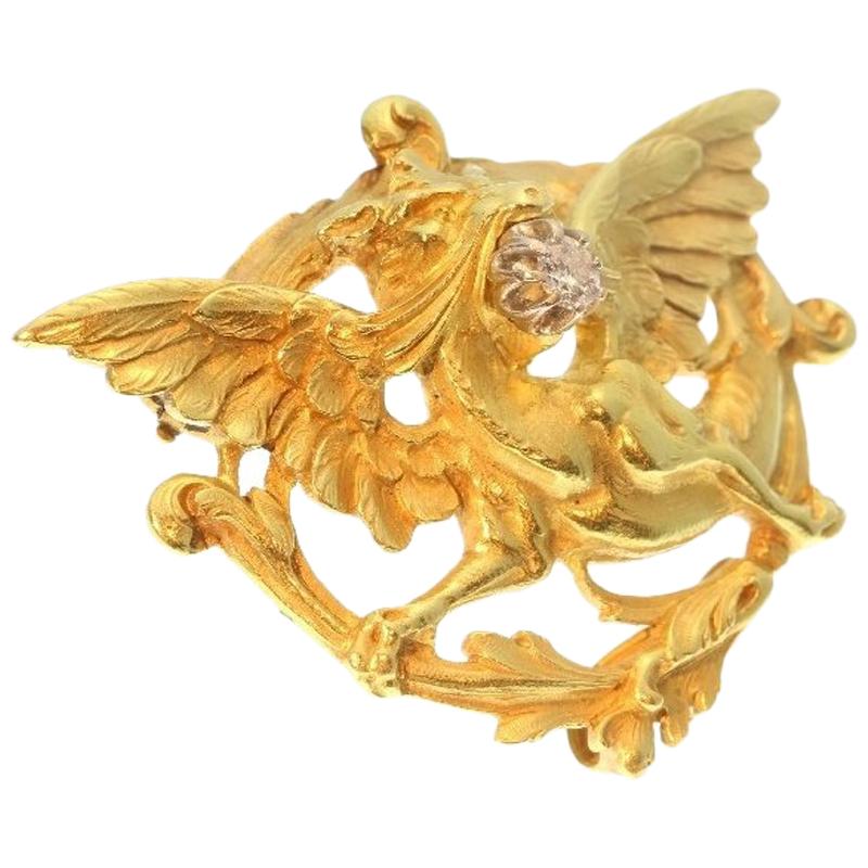 French Antique .15 Carat Diamond & 18 Karat Yellow Gold Griffin Brooch For Sale