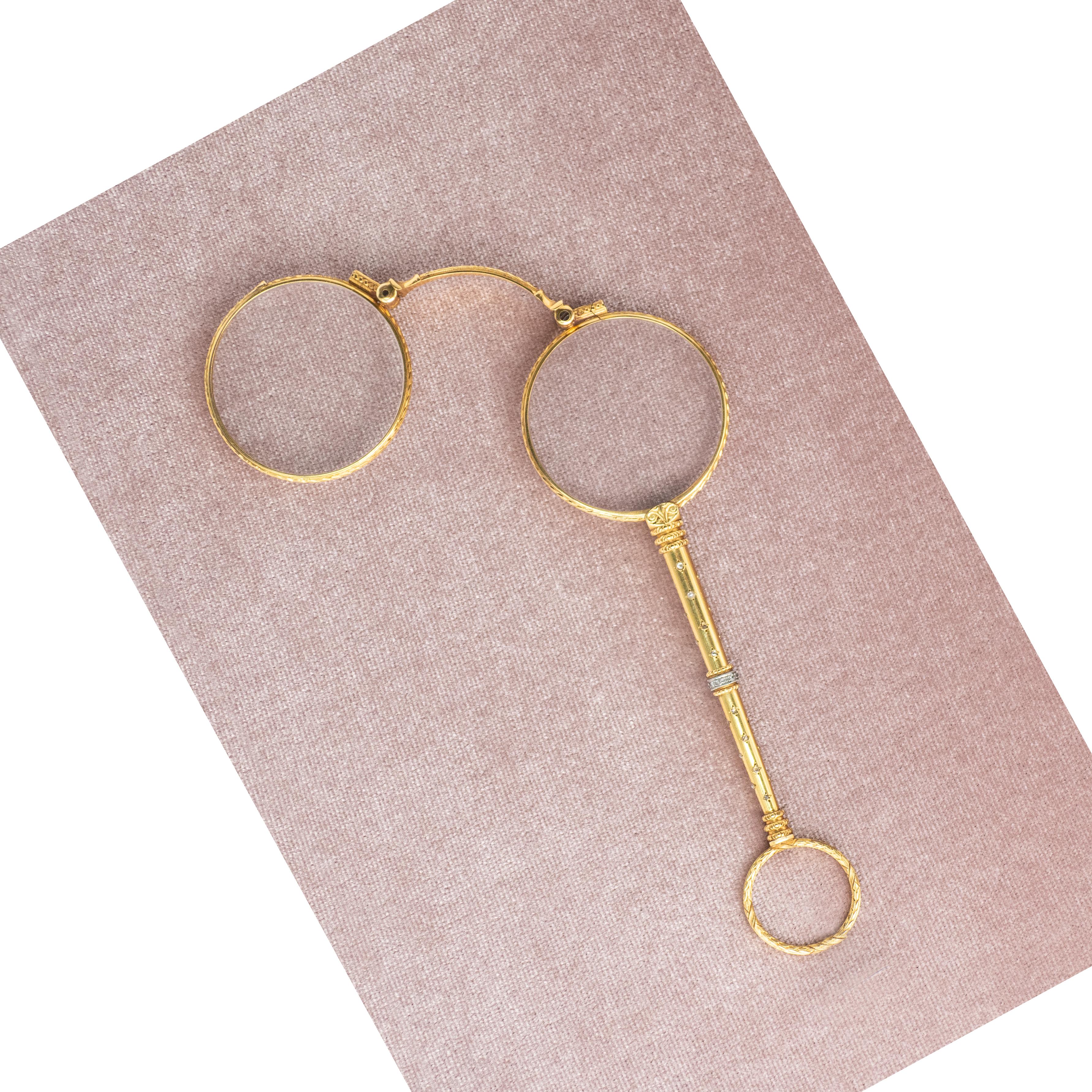 Antique French 18K yellow gold diamond lorgnette pendant set with 40 rose cut diamonds

Approximate Weight: 31.5 grams

Approximate Measurements:
Close - 126mm x 40mm
Open Width - 96mm

Hallmark: 2 French gold hallmarks