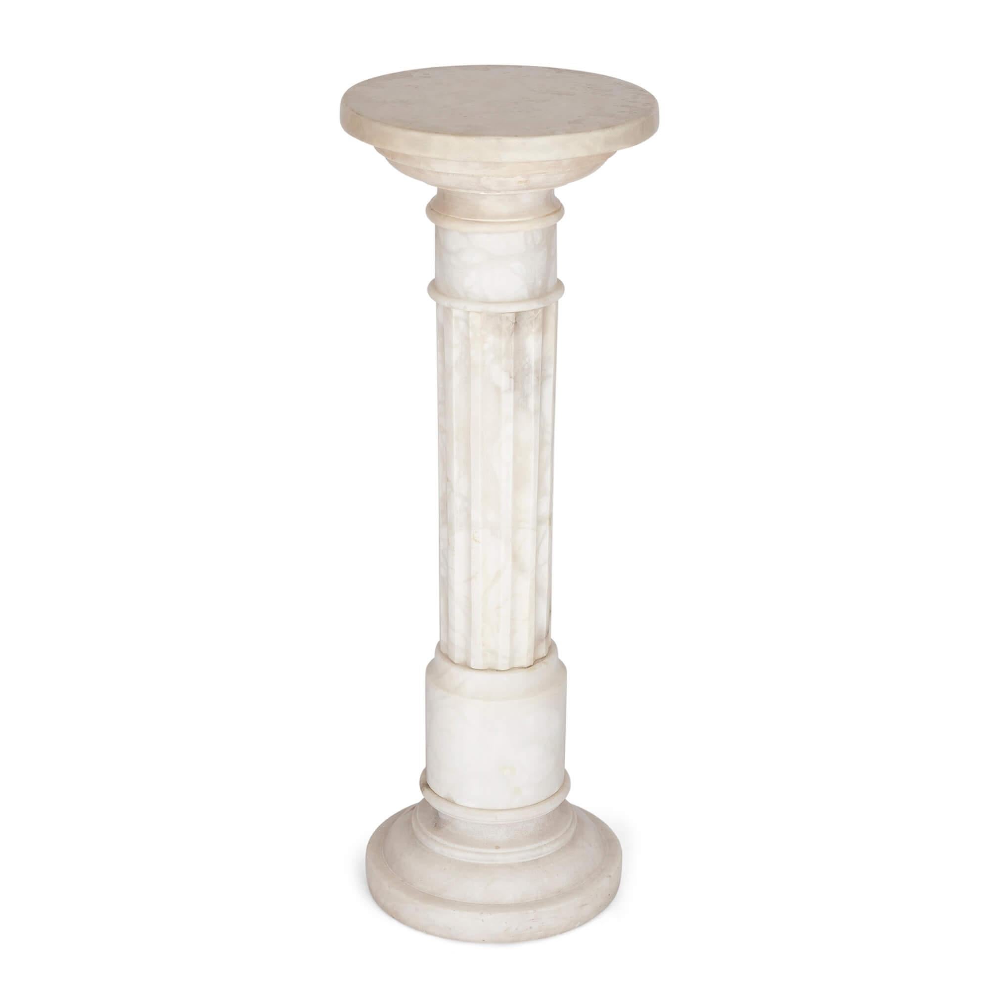 French antique alabaster pedestal
French, Late 19th Century 
Height 80cm, diameter 30.5cm

Shaped in a Neoclassical style form, this superb pure white alabaster pedestal was manufactured in nineteenth century France. 

The top of the pedestal