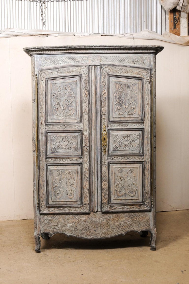 French Antique Armoire Cabinet w/Beautifully-Carved Neoclassical Embellishments In Good Condition For Sale In Atlanta, GA